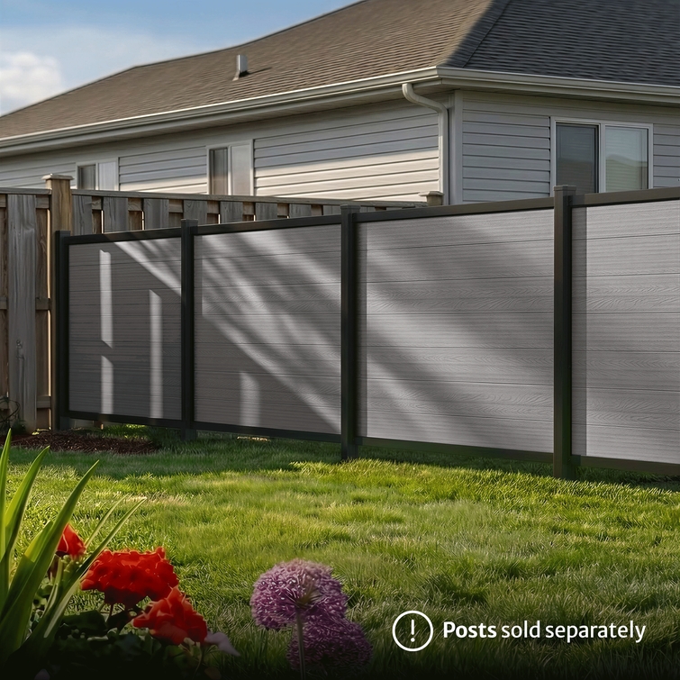 modern backyard with 4ft composite privacy fence in slate grey providing clean and durable boundary