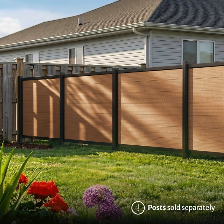 backyard with 4ft composite privacy fence in walnut brown providing a modern and durable outdoor boundary
