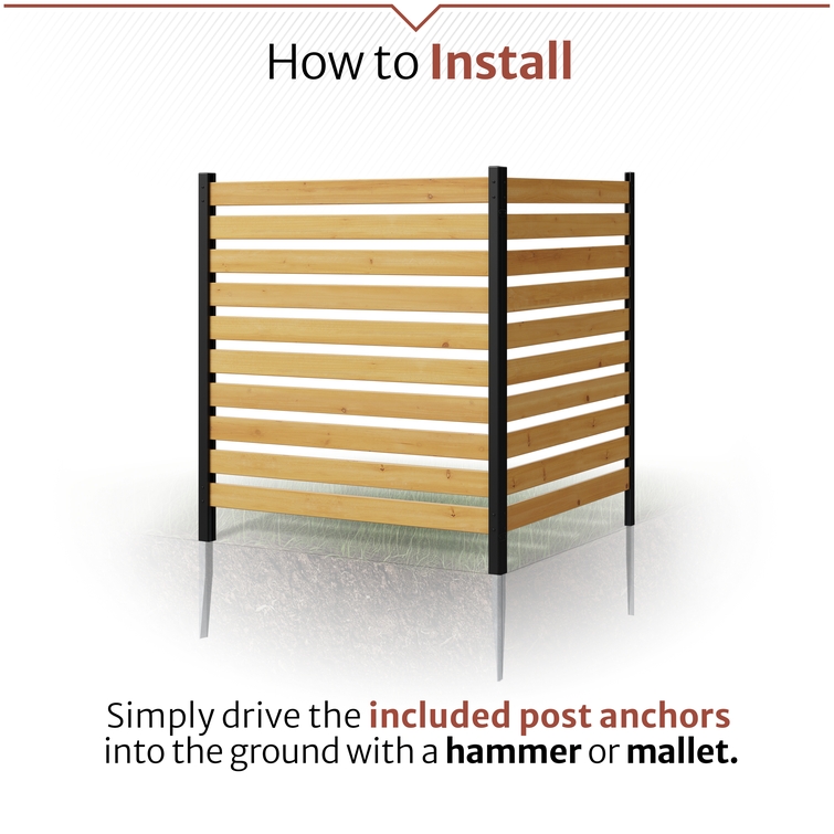 Wood privacy screen installed using aluminum ground anchors driven into soil, showing a no-dig installation method using a hammer or mallet.