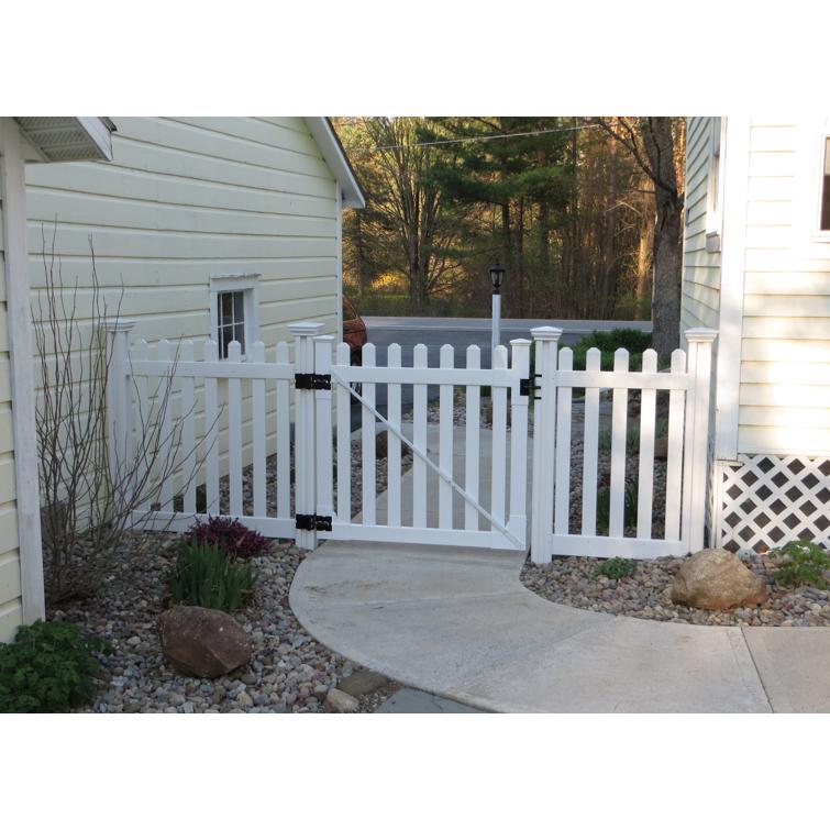 Vinyl picket gate and white picket fence