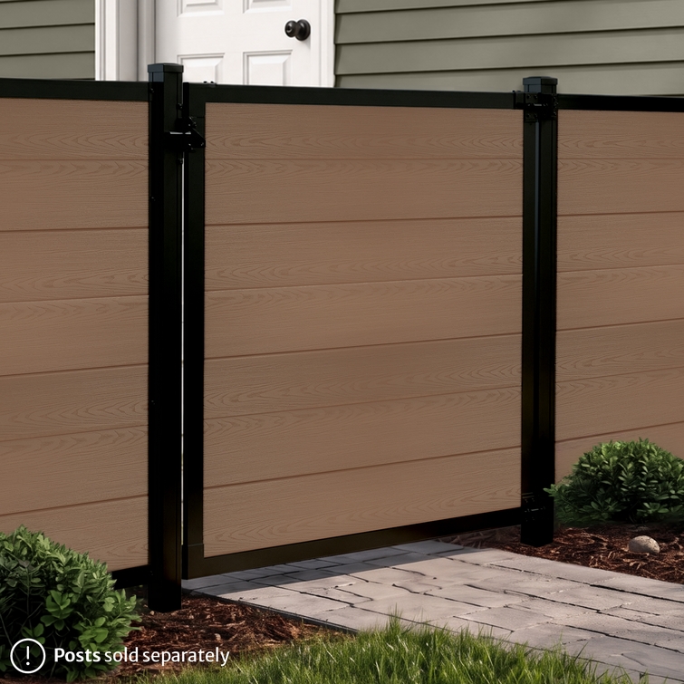 4 ft tall composite privacy fence with walnut brown composite boards, black aluminum frame, and matching walk gate shown closed between fence panels.