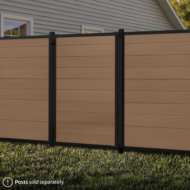 6 ft tall composite privacy fence with walnut brown composite boards, black aluminum frame, and matching walk gate shown closed between fence panels.