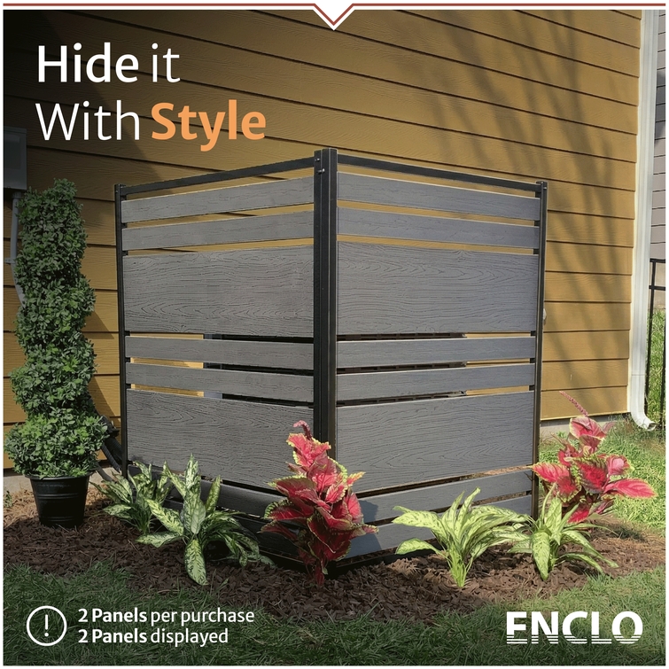 Decorative charcoal composite privacy enclosure designed to conceal outdoor AC units and trash bins beside a home