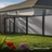 modern backyard with 4ft composite privacy fence in slate grey providing clean and durable boundary