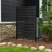 Enclo charcoal wood privacy screen panel concealing an outdoor air conditioner unit beside a house