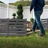 Freestanding WoodTek vinyl fence panels creating low profile garden border in backyard landscape