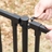 Hand operating gate latch on Zurich fence gate hardware kit demonstrating easy open and close function