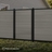 6 ft tall composite privacy fence with slate gray composite boards, black aluminum frame, and matching walk gate shown closed between fence panels.