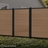 6 ft tall composite privacy fence with walnut brown composite boards, black aluminum frame, and matching walk gate shown closed between fence panels.