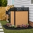Decorative outdoor privacy screen with laser-cut black metal accent panels and wood-look composite boards
