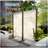 Two Enclo outdoor privacy screens arranged side by side near a swimming pool to create instant privacy and separation.